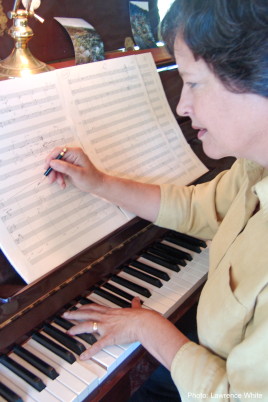 Hilary Tann working at the piano